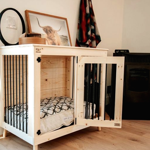 a lovely kennel bed of lightstained wood and on comfortable legs is a cool solution for a farmhouse space