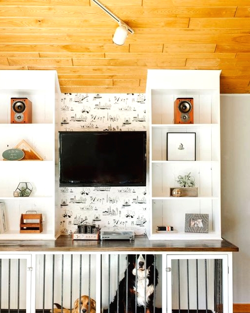 a TV unit with open shelves and a large dog kennel built in into the lower part of it is a cool idea for your space