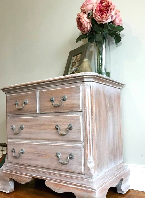 a whitewashed vintage sideboard on refined carved wooden legs is a lovely idea for a farmhouse space