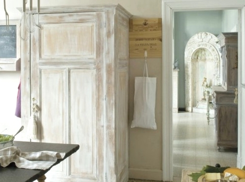 a pretty shabby chic whitewashed storage unit with a tassel is a cool solution for a shabby chic or rustic space