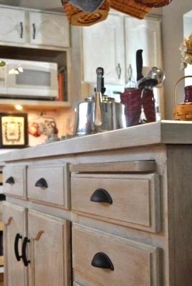 a whitewashed cabinet for a modern or farmhouse kitchen is a lovely idea - just whitewash your own stained cabinet and voila