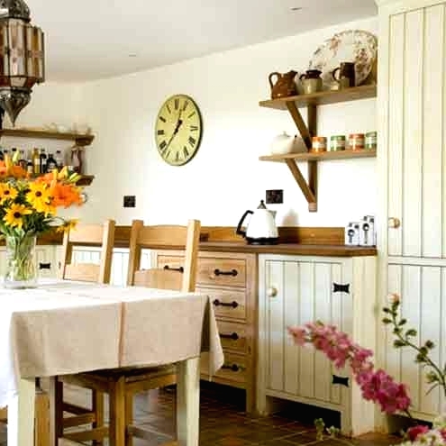 whitewashed kitchen cabinetry is a lovely idea for a farmhouse or rustic space, and it looks simple and very cool