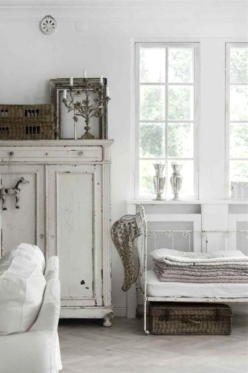 a whitewashed cabinet is a stylish idea for a Scandinavian, shabby chic or just vintage interior and it looks very cool