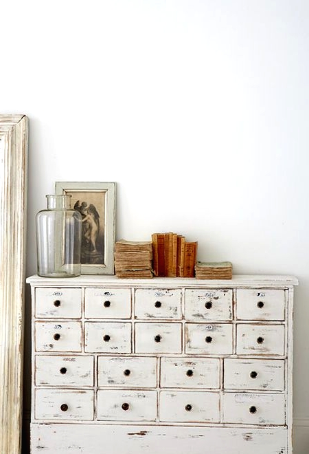 a vintage whitewashed file storage unit is an elegant idea for a vintage space, for a Scandi or shabby chic one