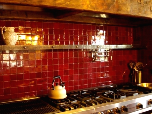 a bold deep red mini tile backsplash is a lovely idea and a touch of color to the space, it will make your space stand out a lot