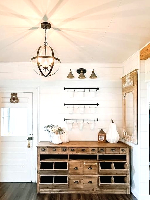 a cabinet made of reclaimed wood is an eco-friendly way to repurpose old wood and a lovely farmhouse touch to the space