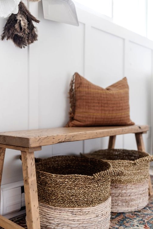 such a skinny reclaimed wood bench is a perfect addition to the rustic space and it gives coziness to the room