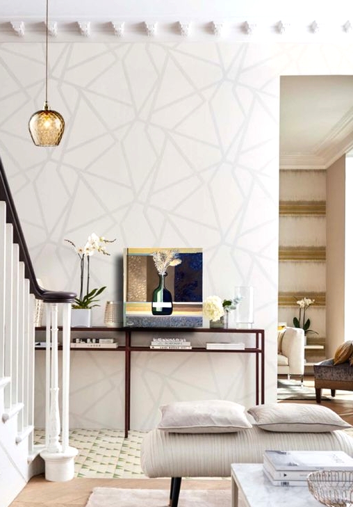 a neutral wall with a chaotic geometric pattern is a cool idea to add an eye-catchy touch and an interesting look to the space