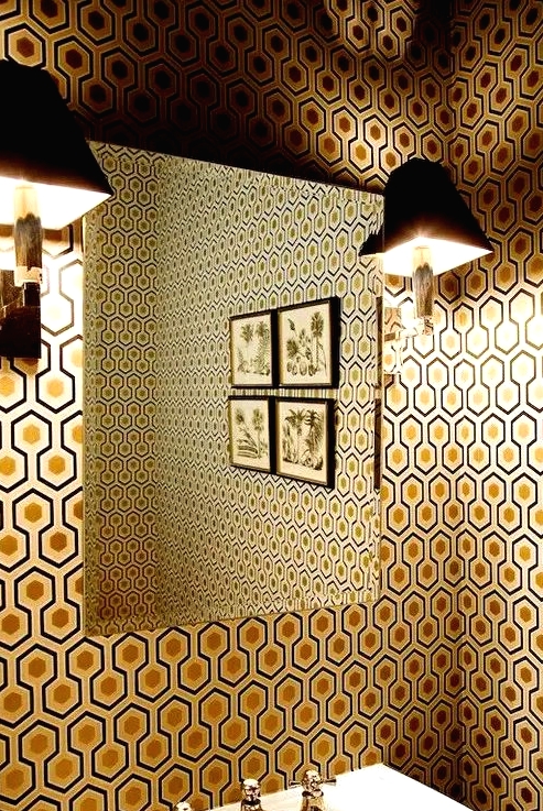 an elegant vintage-inspired bathroom decorated with hexagon print with gold inside wallpaper that brings chic to the space