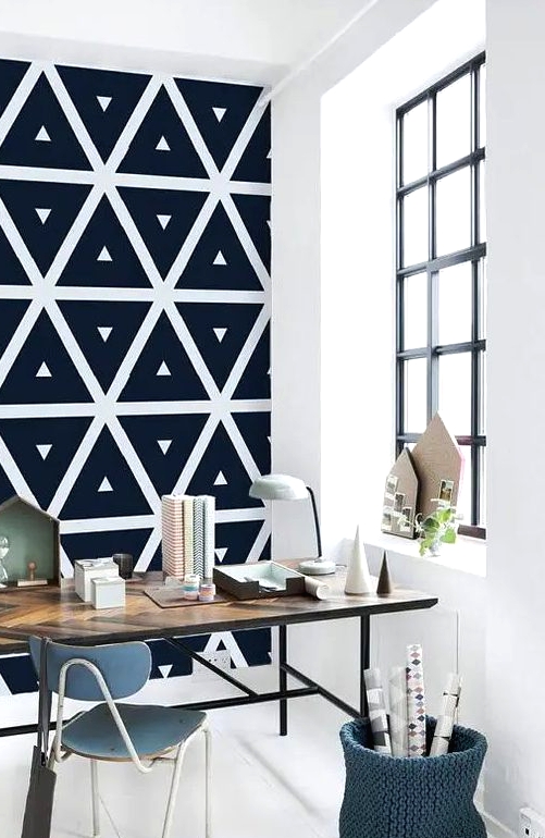 monochromatic geometric self-adhesive wallpaper is a great idea for a modern workspace, to make it bolder and statement-like