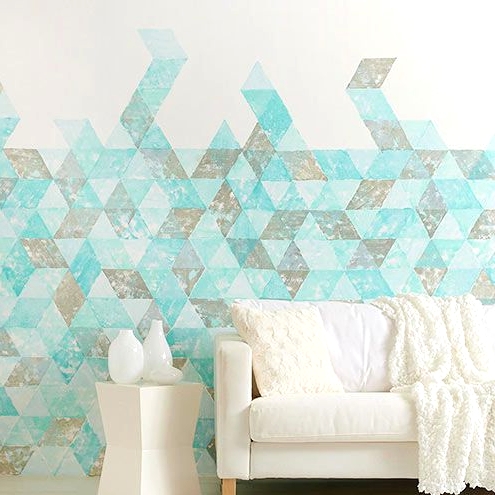 a beautiful grey, turquoise and white geo print accent wall will add color to the space and is an ideal thing for a coastal home