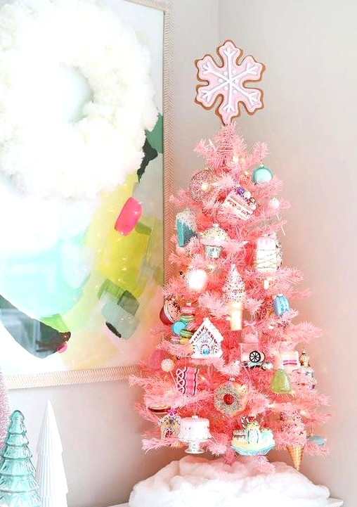 a large white plywoof snowflake tree topper is a perfect match for this cool and bright farmhouse Christmas tree